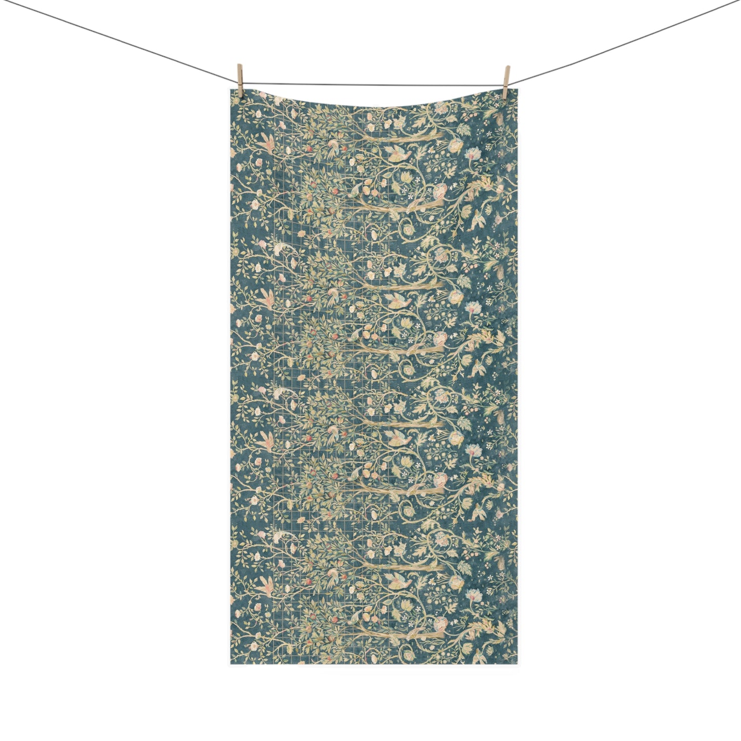 A rectangular textile hanging from a clothesline with two wooden clips, featuring an all-over dense floral and botanical pattern in muted teal, beige, and soft pink tones against a plain white background.