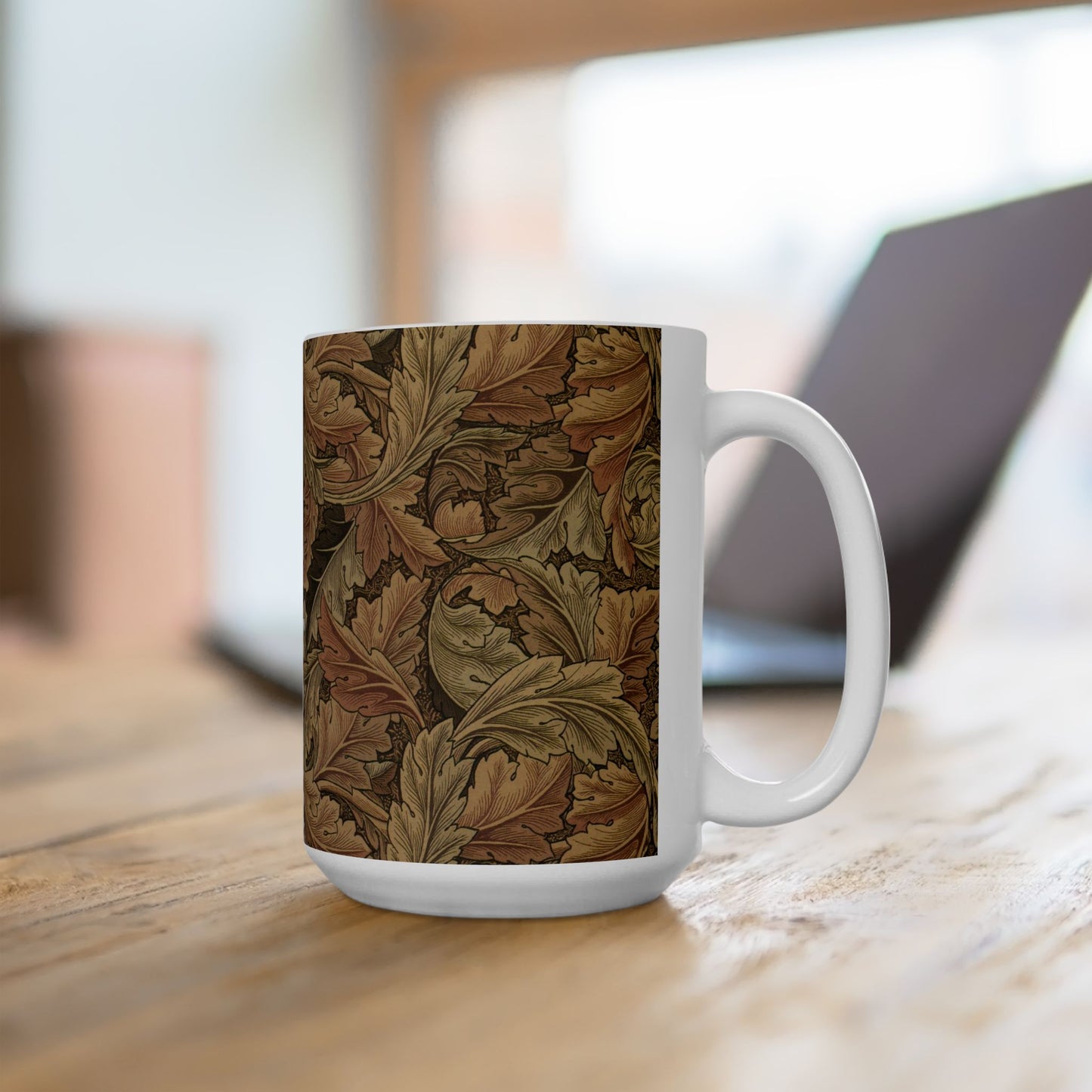 A ceramic mug with a brown and white geometric pattern inspired by William Morris - Acanthus Collection.
