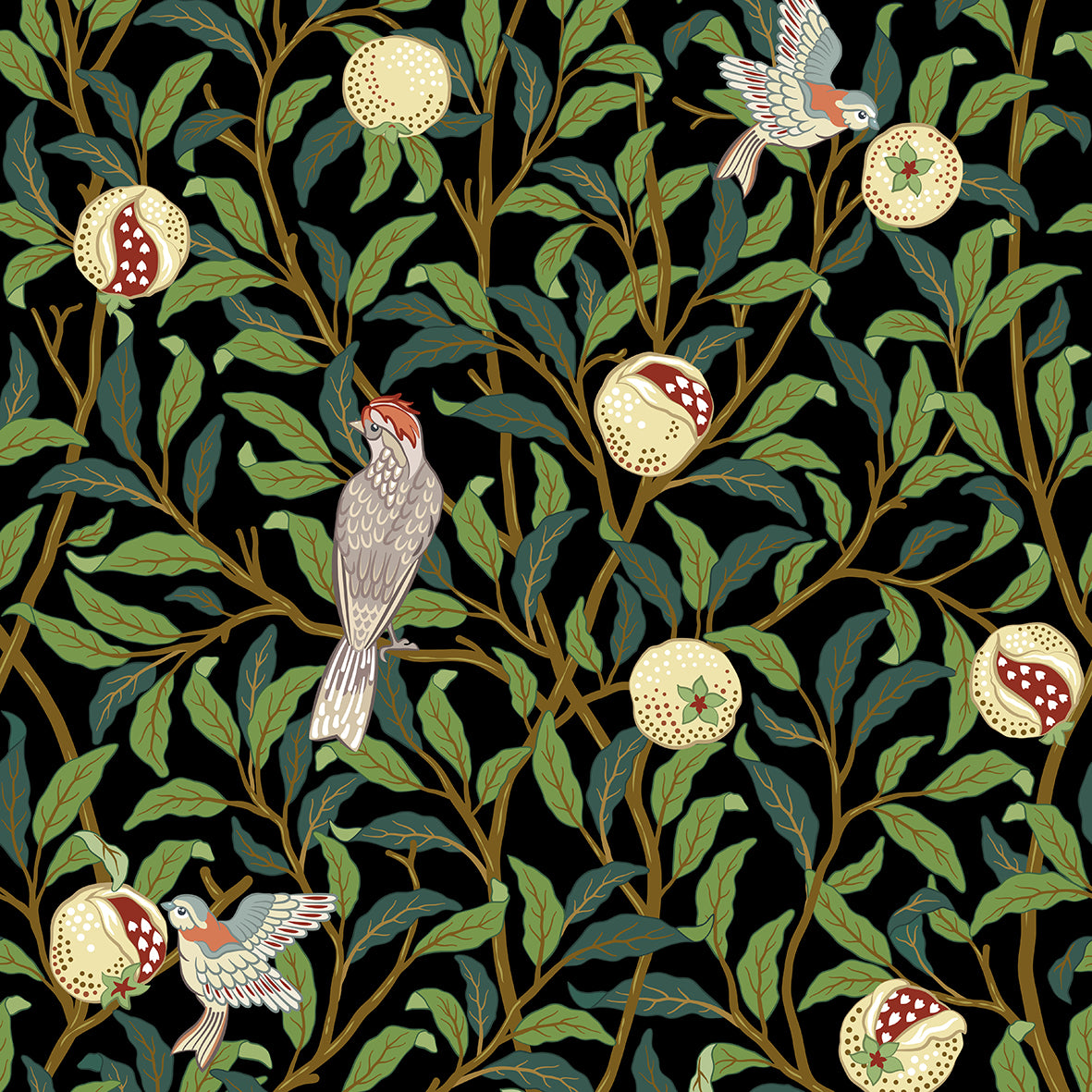 A cotton twill napkin with a floral design, featuring birds and pomegranates, laid on a plate next to a fork and a piece of bread.