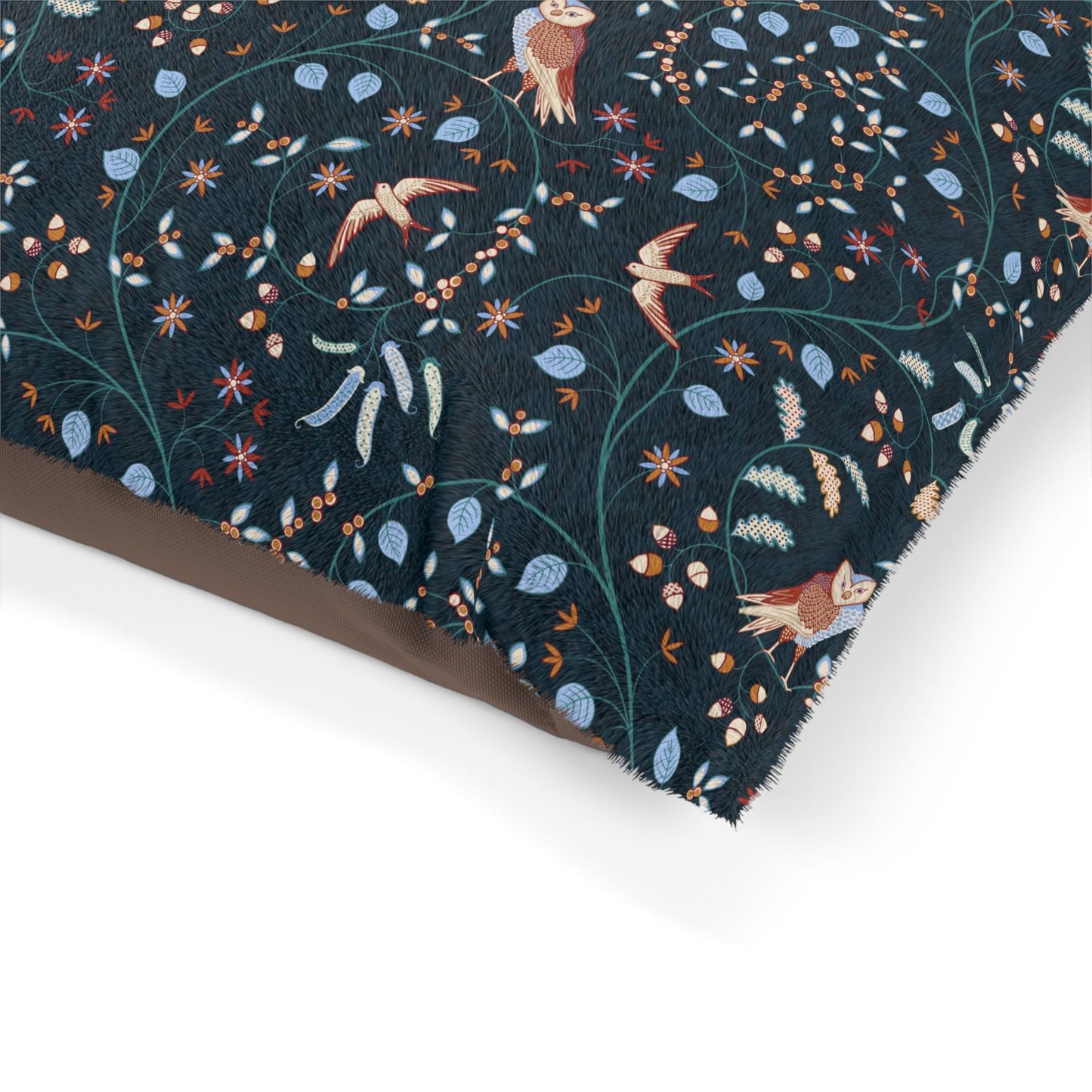 Decorative fabric with floral and bird pattern on a white background