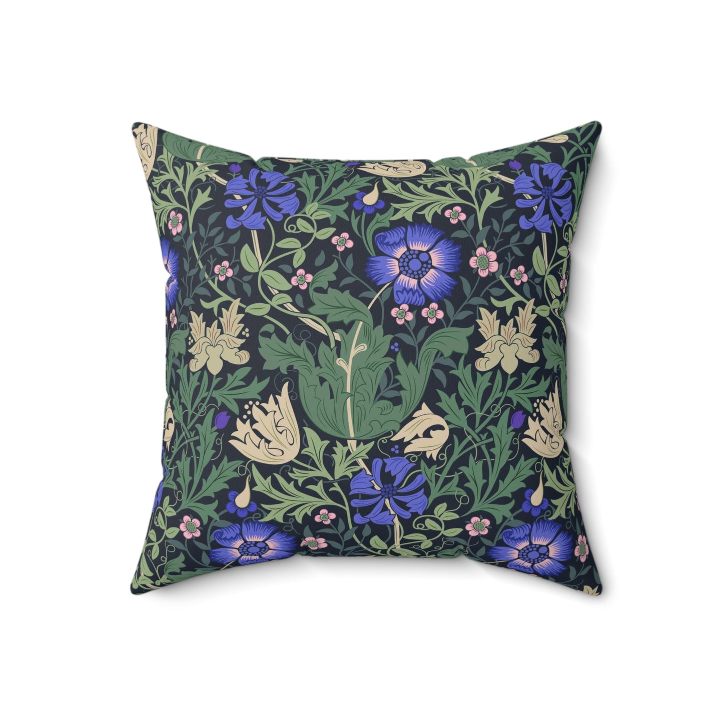 A square-shaped faux suede cushion with a floral William Morris & Co pattern featuring blue flowers and green leaves on a dark background called Compton.