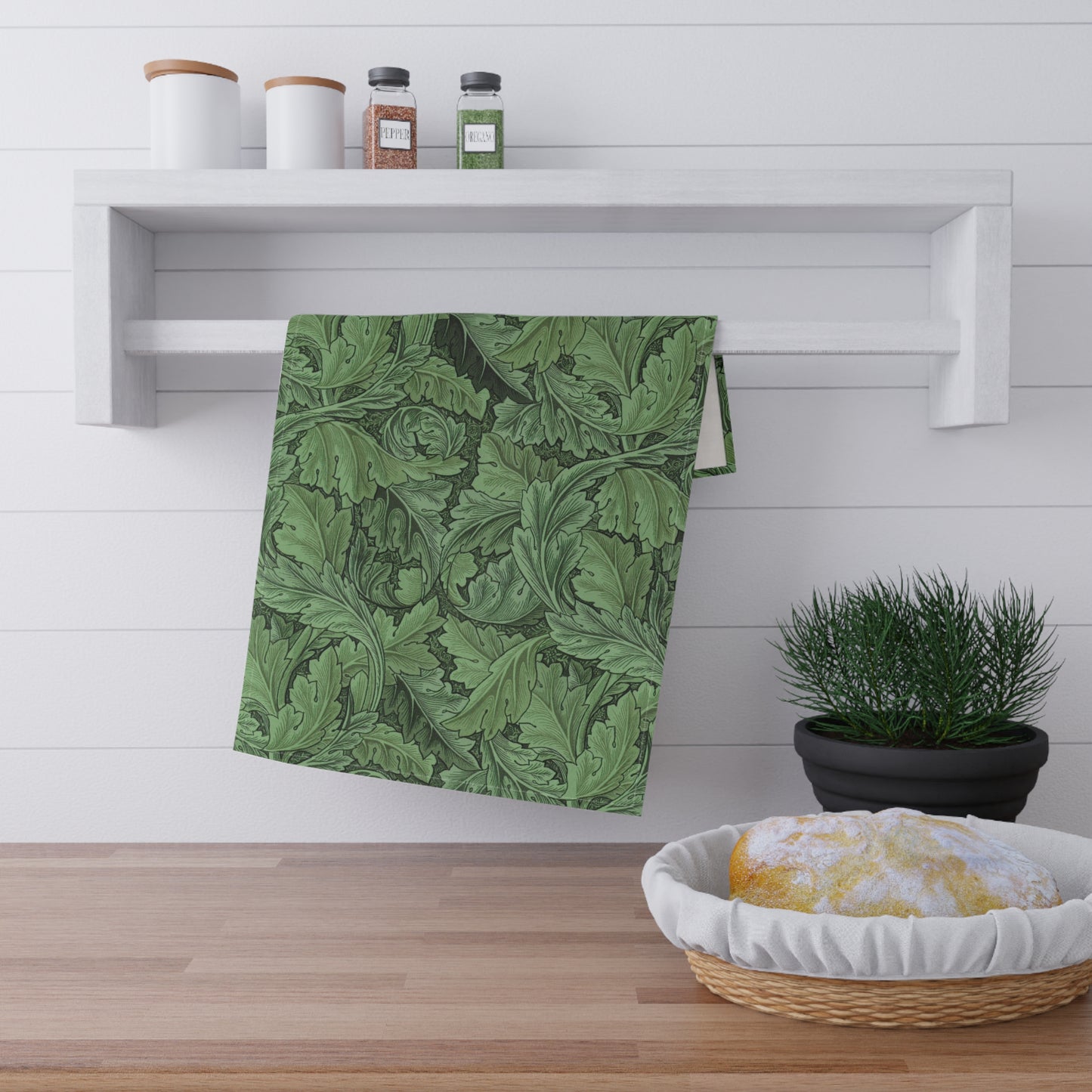 A green kitchen tea towel with a floral Art Nouveau pattern inspired by William Morris - Acanthus Collection.