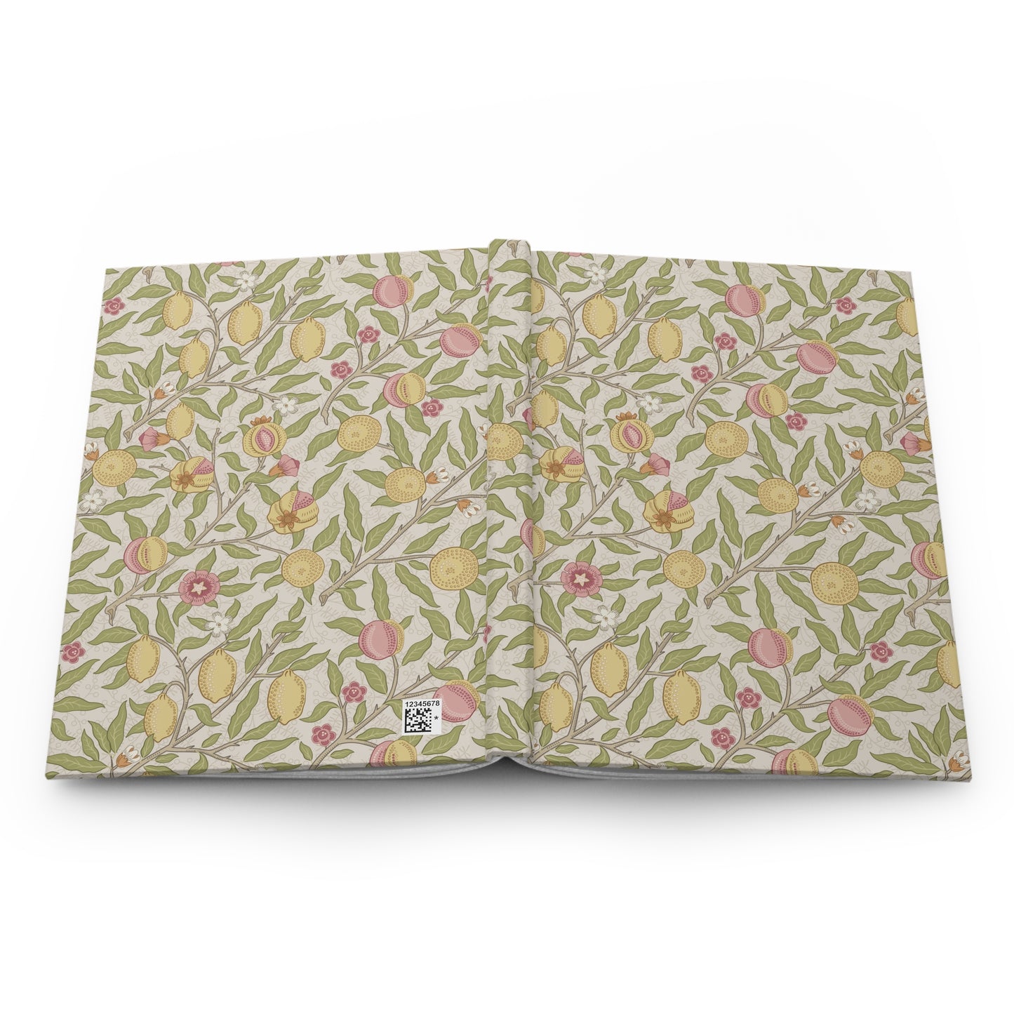Floral patterned notebook with lemons and leaves on a white background