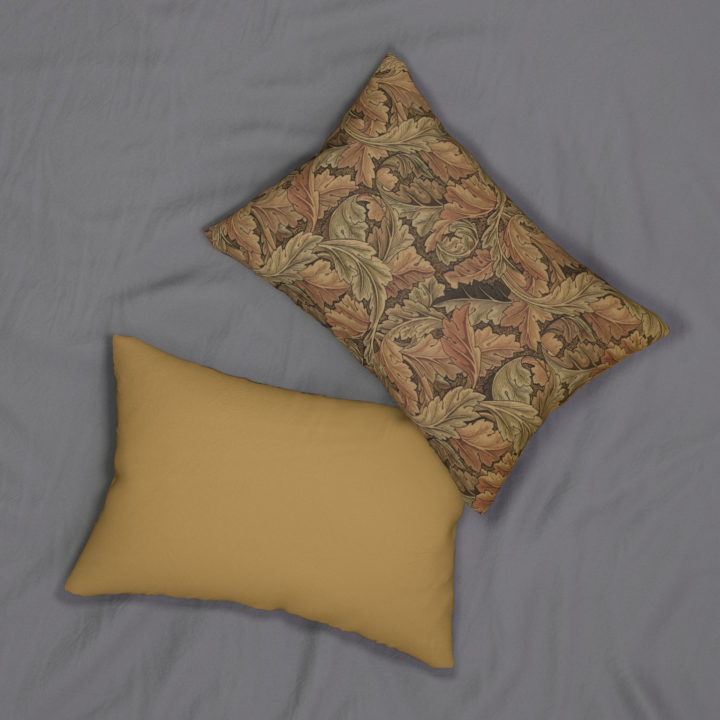 A rectangular lumbar cushion with a William Morris & Co floral pattern in brown, beige, and green colours, featuring a concealed zipper.