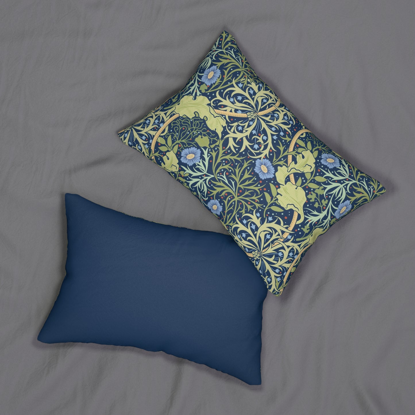 Rectangular lumbar cushion with a floral William Morris & Co pattern in blue, green, and yellow hues, featuring a hidden beige zipper.
