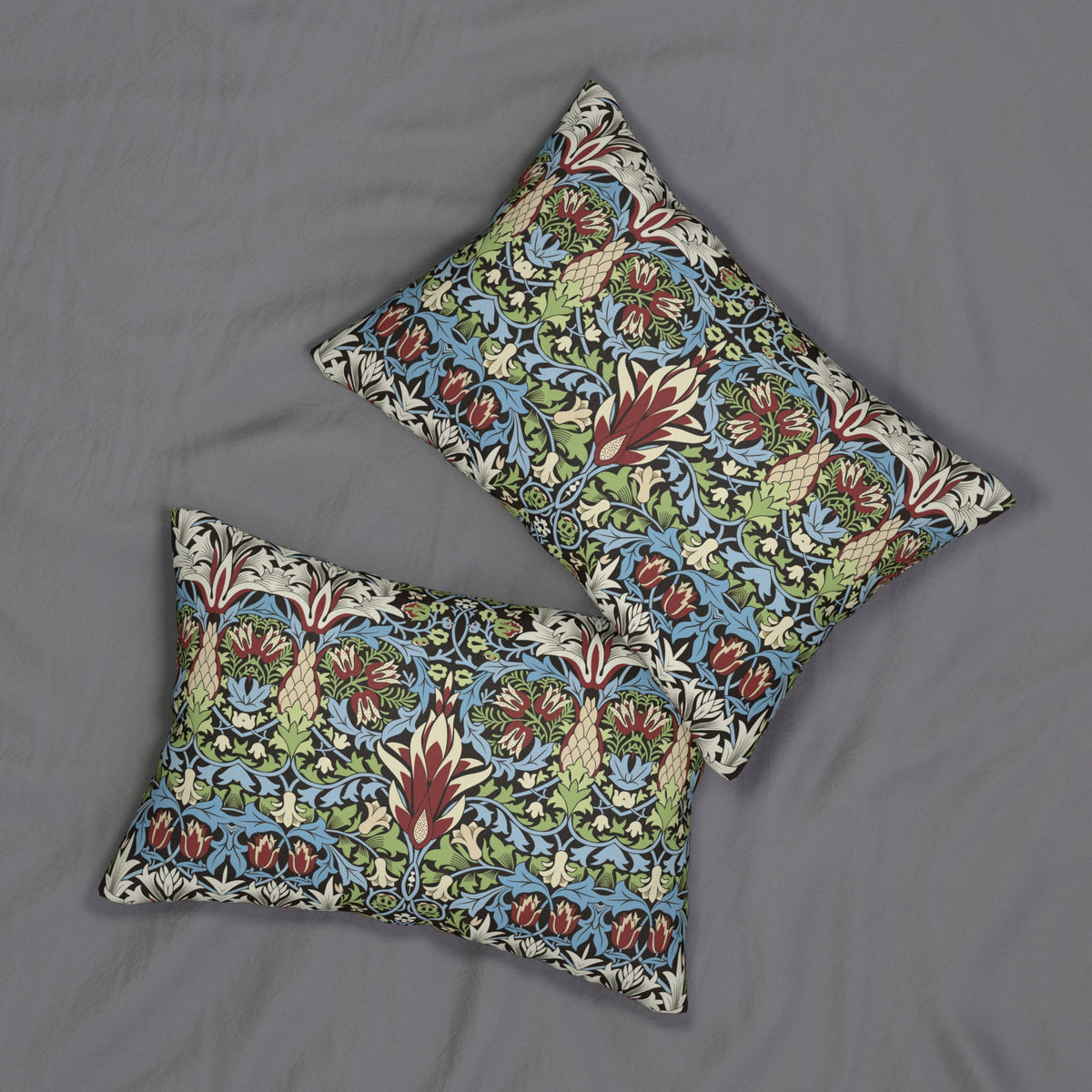 Lumbar Cushion designed by William Morris & Co in a red, blue and green floral pattern called Snakeshead Collection