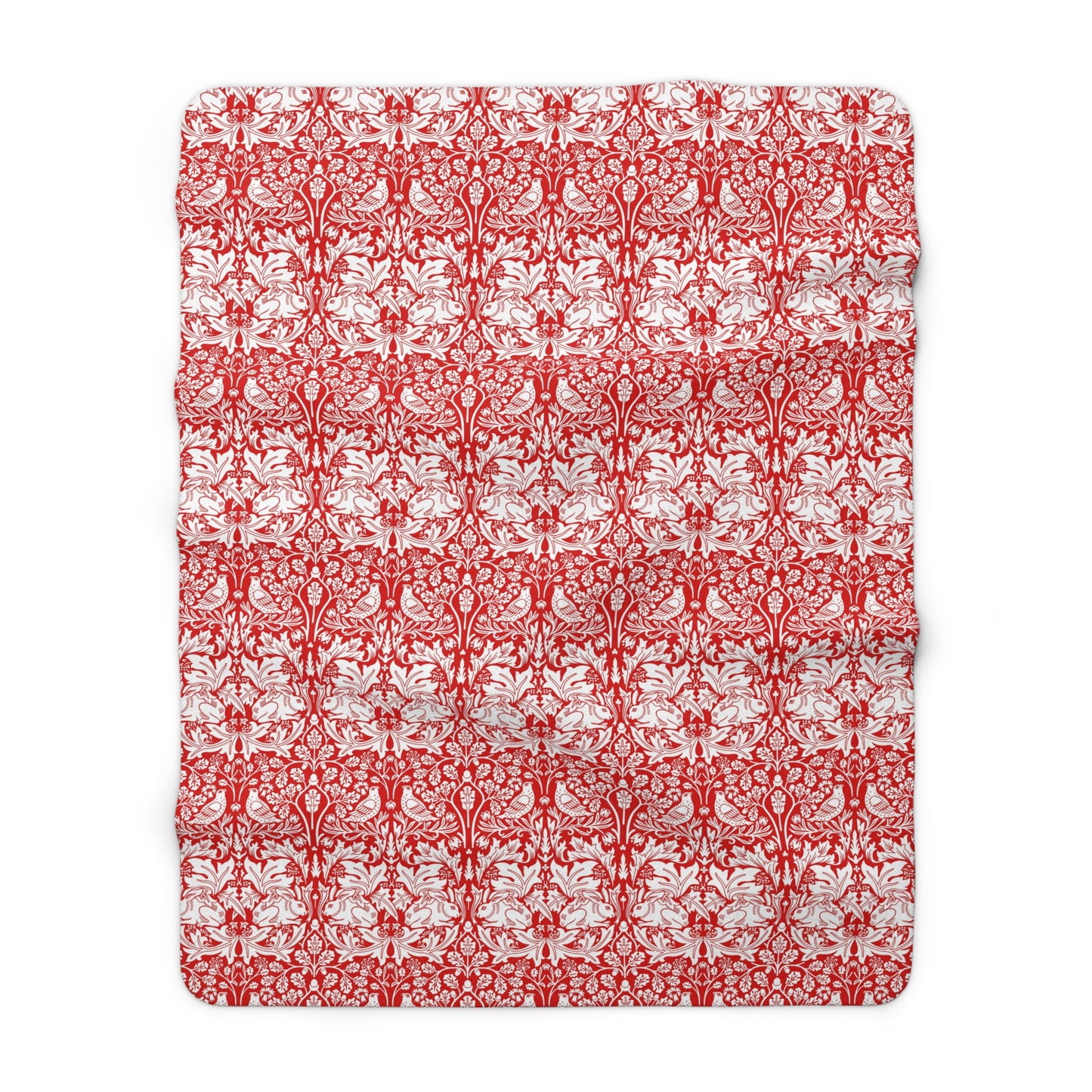 Red and white patterned blanket on a white background