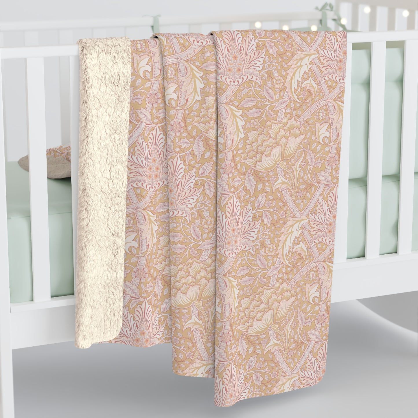 A beige and brown patterned Sherpa fleece blanket inspired by William Morris, from the Windrush Collection.