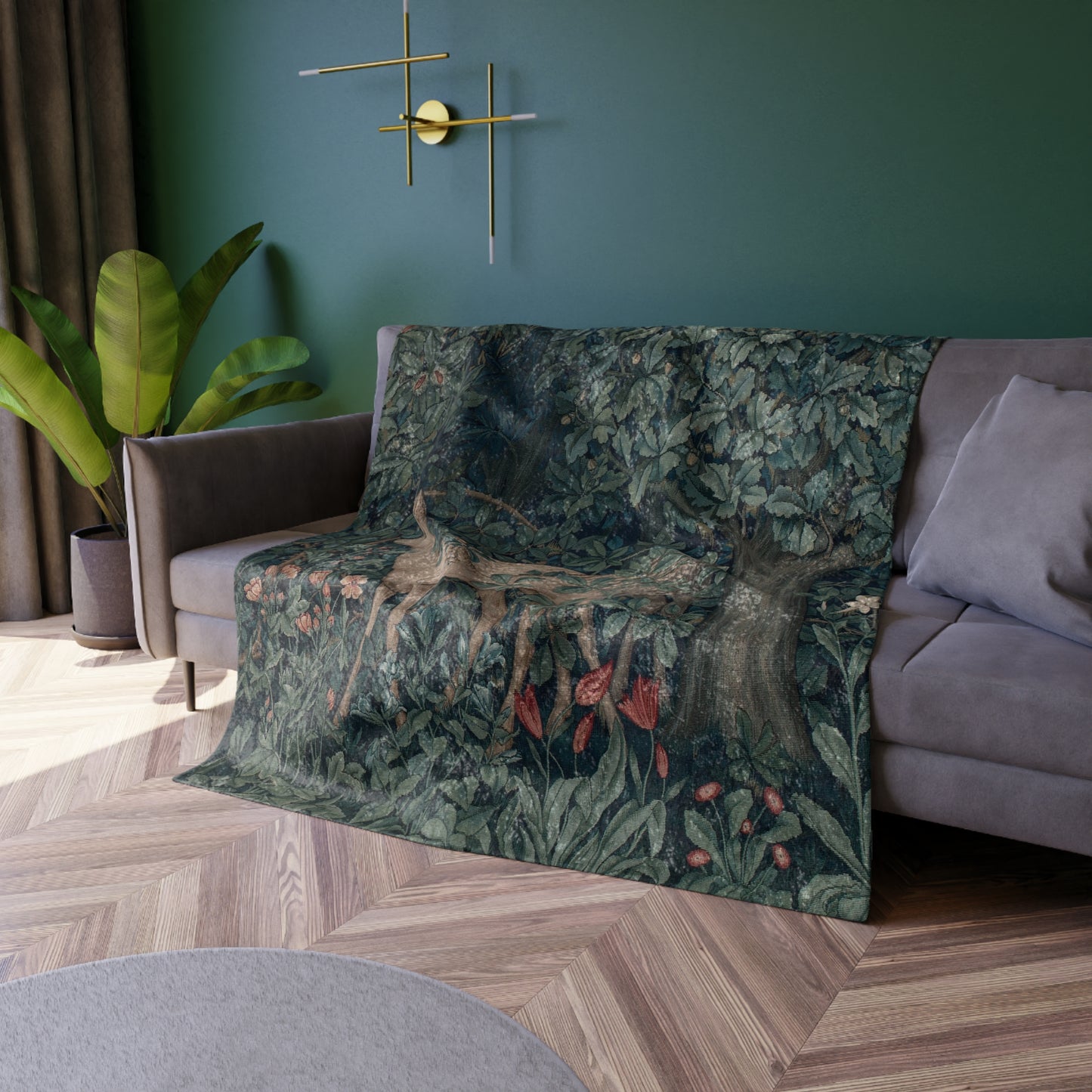 A lush crushed velvet blanket with a greenery design, inspired by William Morris, with hemmed edges and a silky finish.