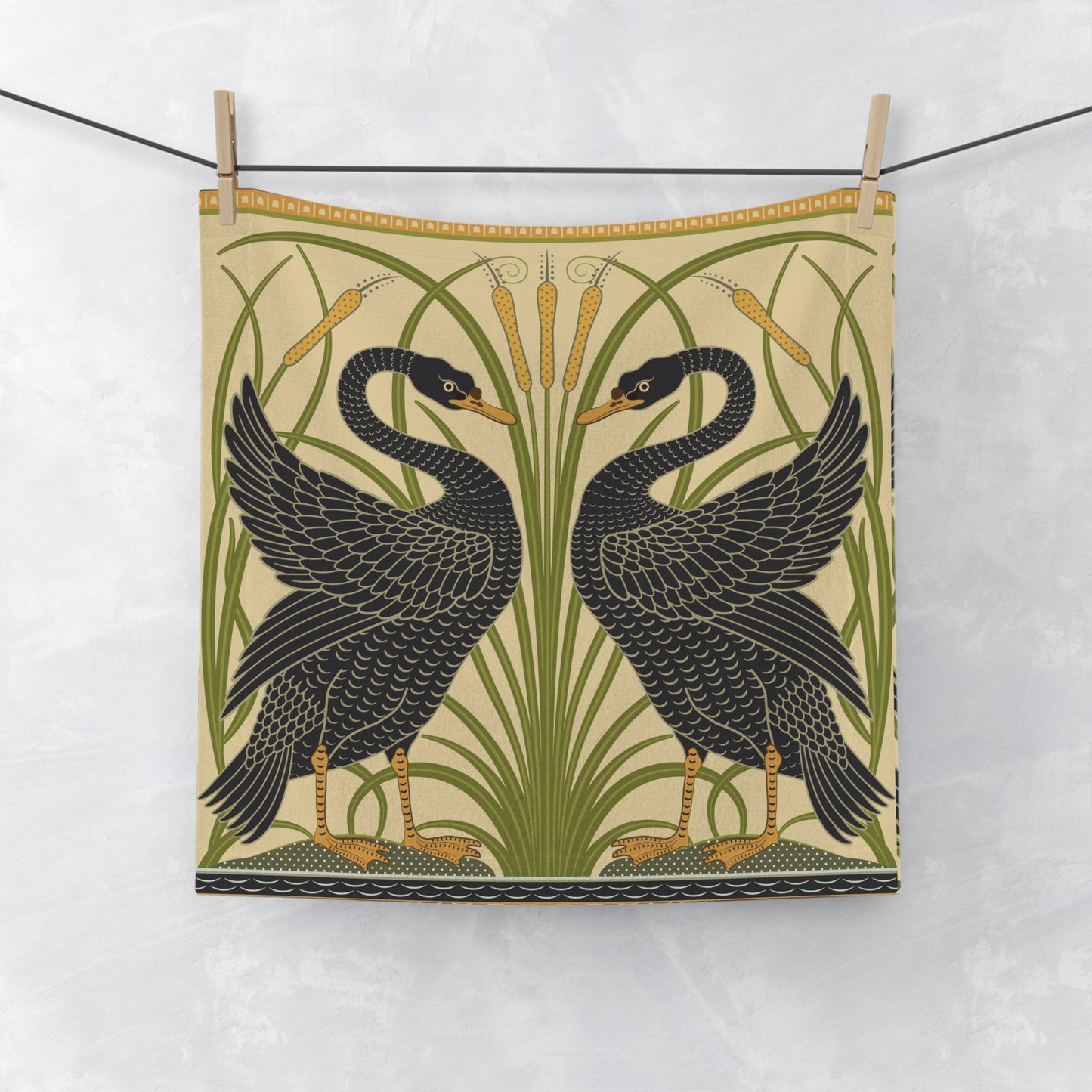 Tea towel with black swan design on a white background