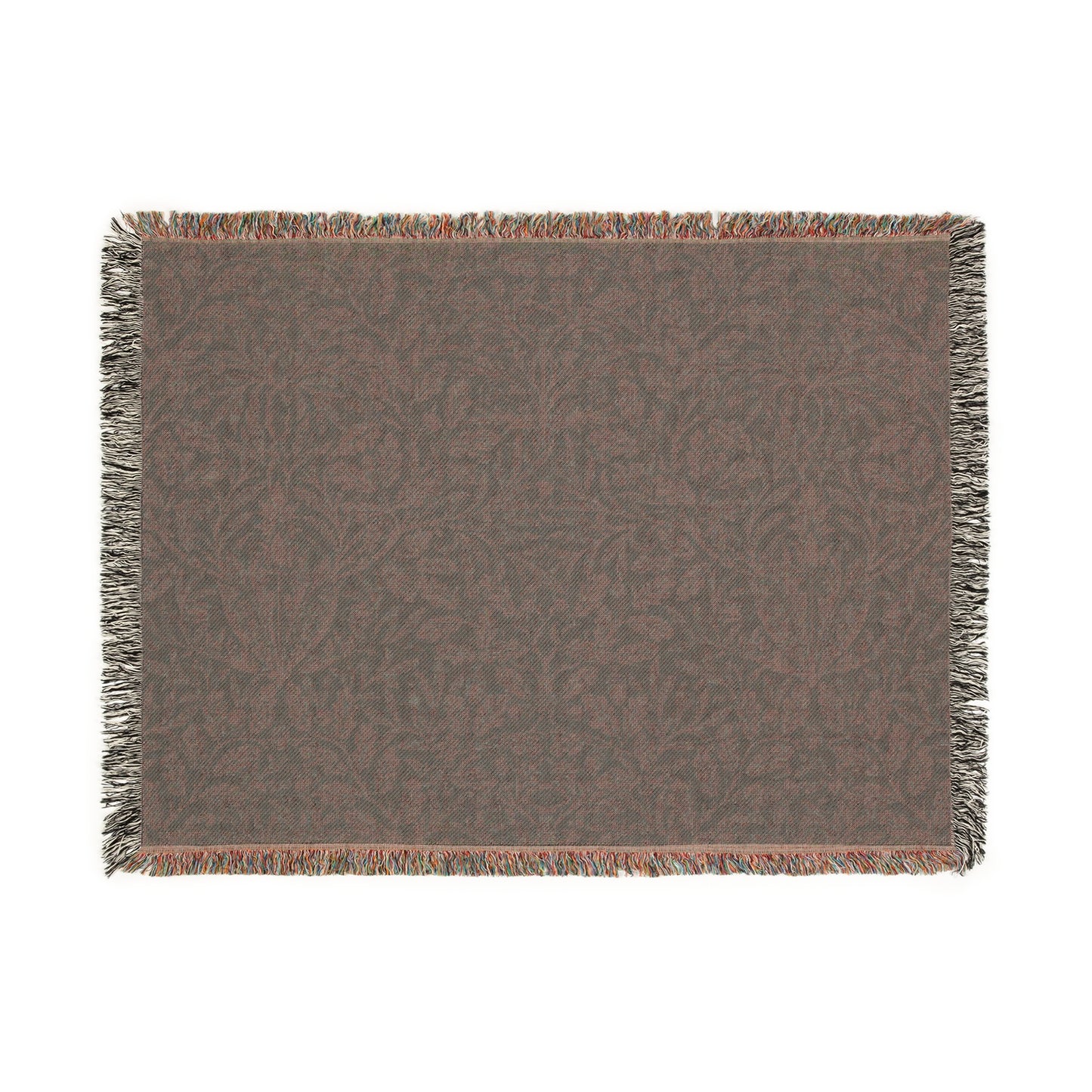 A woven cotton blanket with a William Morris & Co floral geometric pattern in teal colour, featuring a fringe.