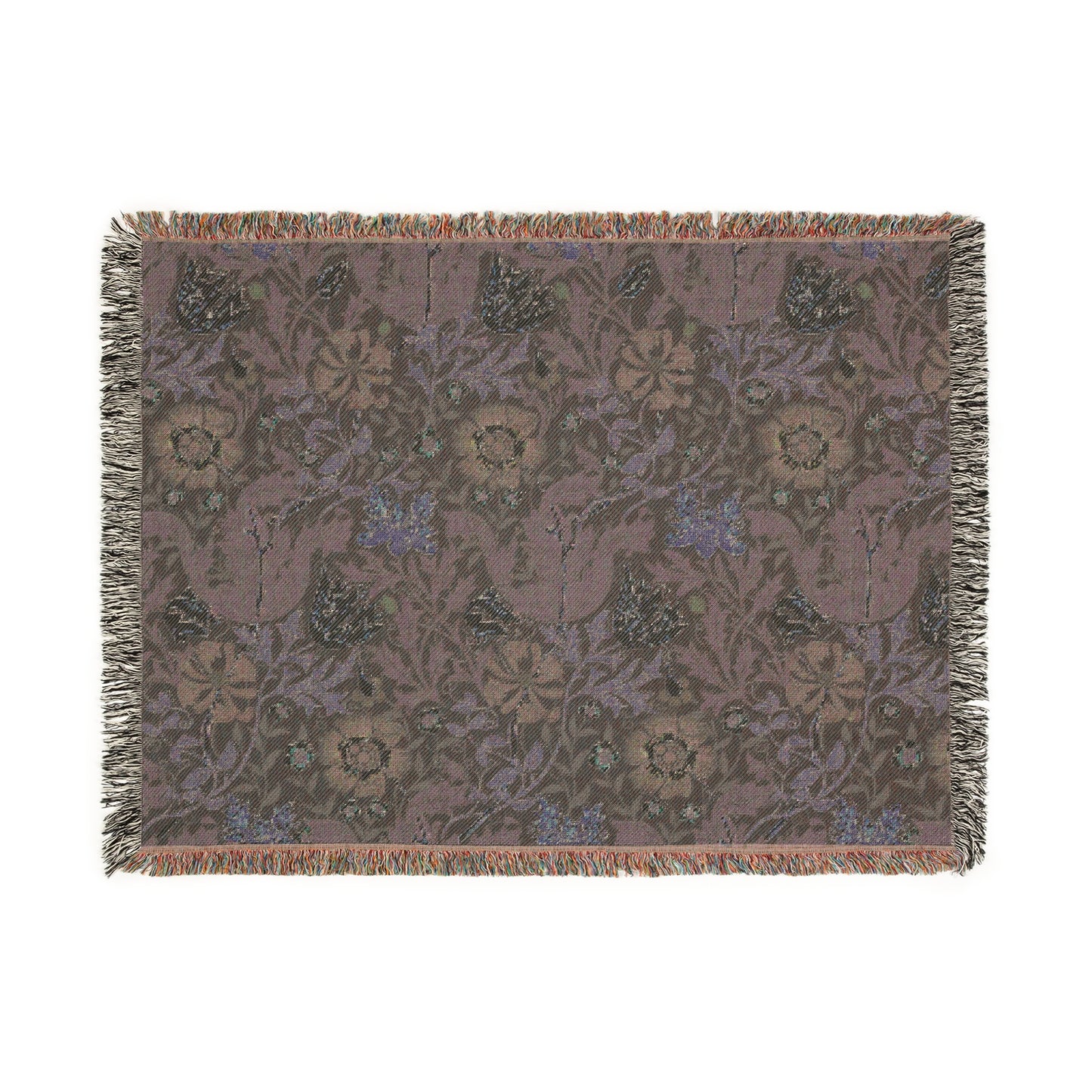 A woven cotton blanket with a floral William Morris & Co pattern in blue, green, and beige colours, featuring fringed edges.