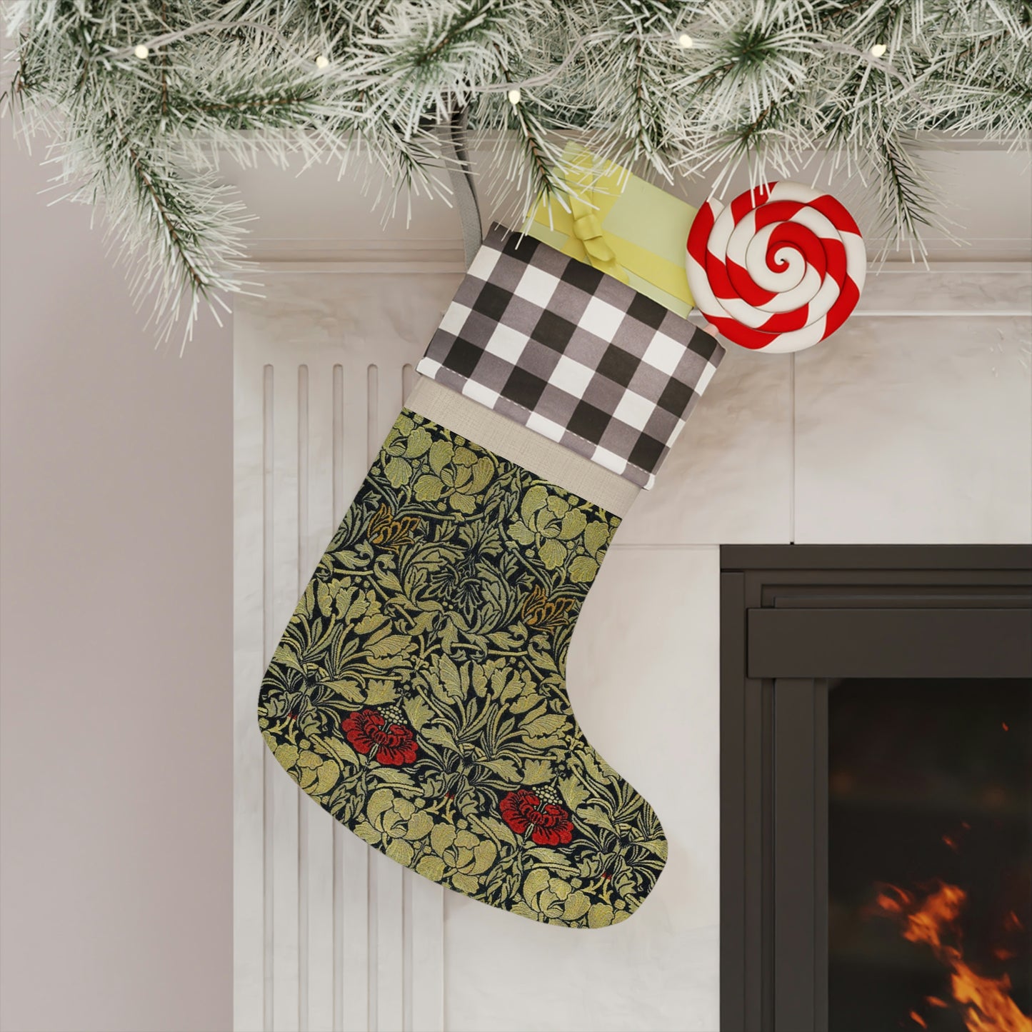 A one-sided printed Christmas stocking with a William Morris & Co floral pattern, red and black cuff at the top, and a beige bottom.
