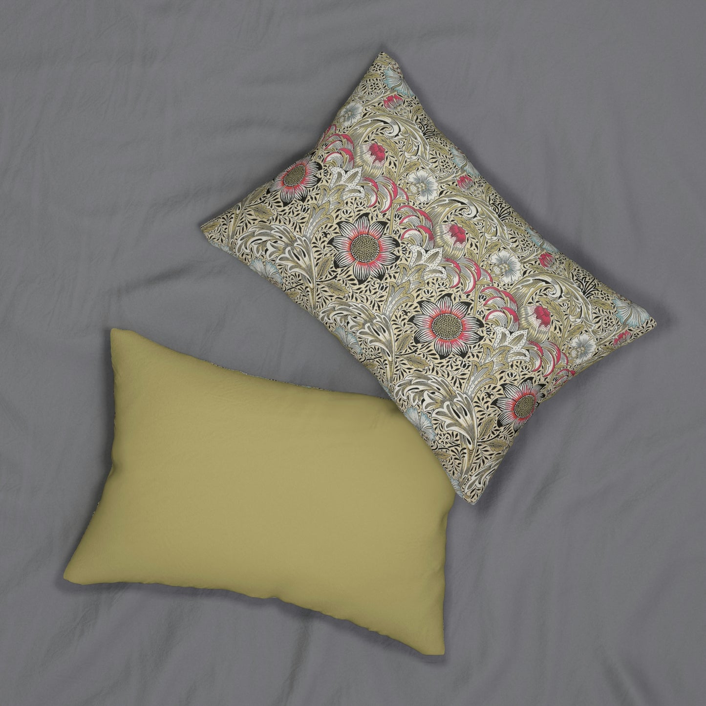 A rectangular lumbar cushion with a floral William Morris & Co pattern and a concealed zipper, in a multicolour design featuring predominantly green, beige, and pink tones.