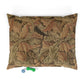 Decorative dog pillow with William Morris & Co leaf pattern on a white background