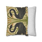 Decorative pillow with black swan design and a striped pillow next to it on a white background