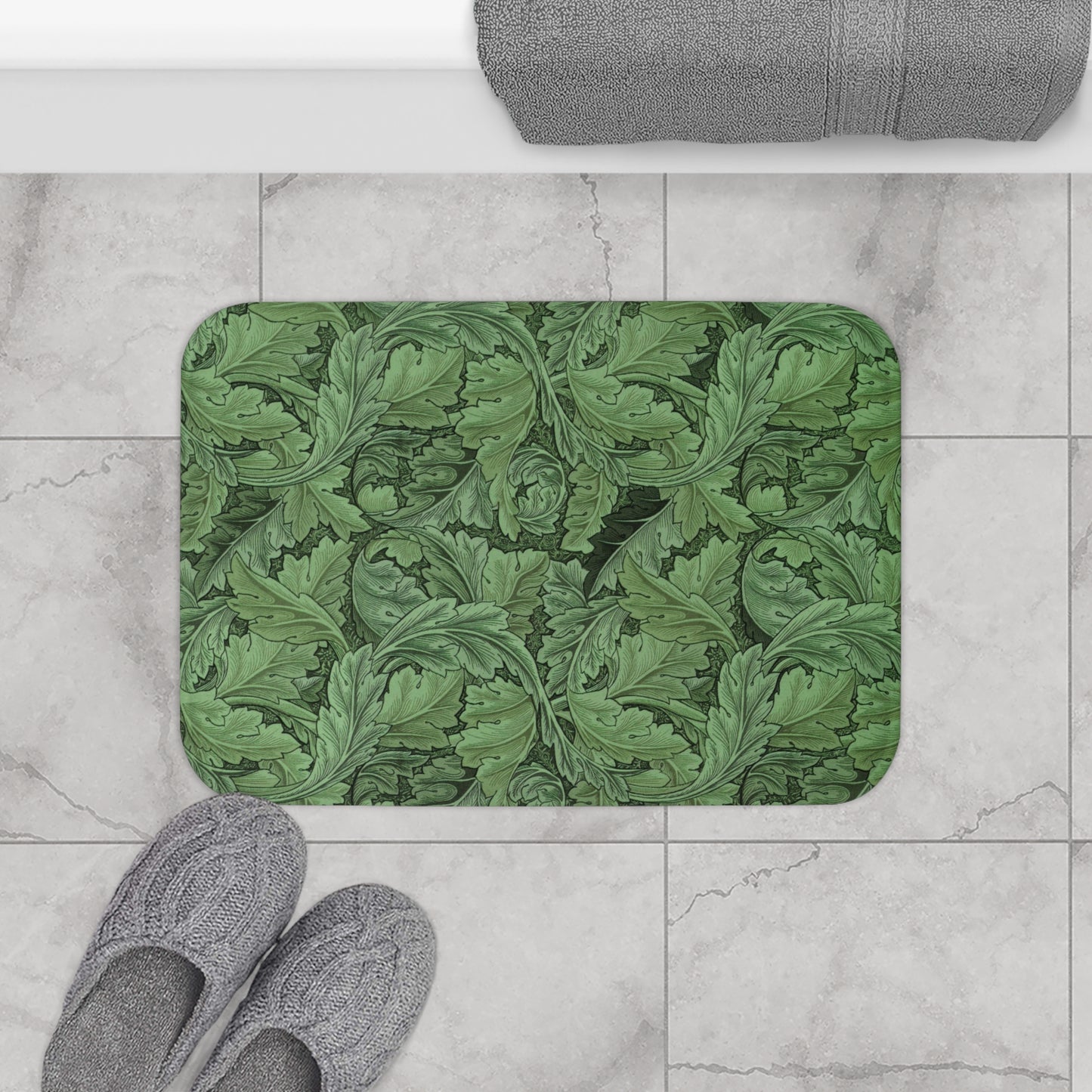 Microfibre bath mat with a green floral pattern inspired by William Morris' Acanthus collection.