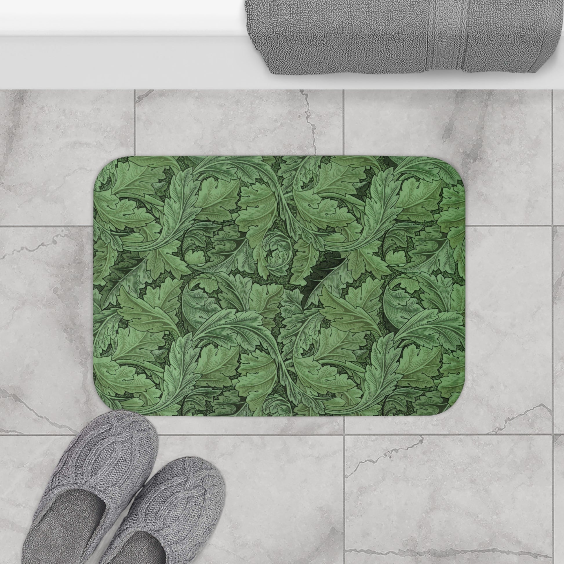 Microfibre bath mat with a green floral pattern inspired by William Morris' Acanthus collection.