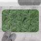 Microfibre bath mat with a green floral pattern inspired by William Morris' Acanthus collection.