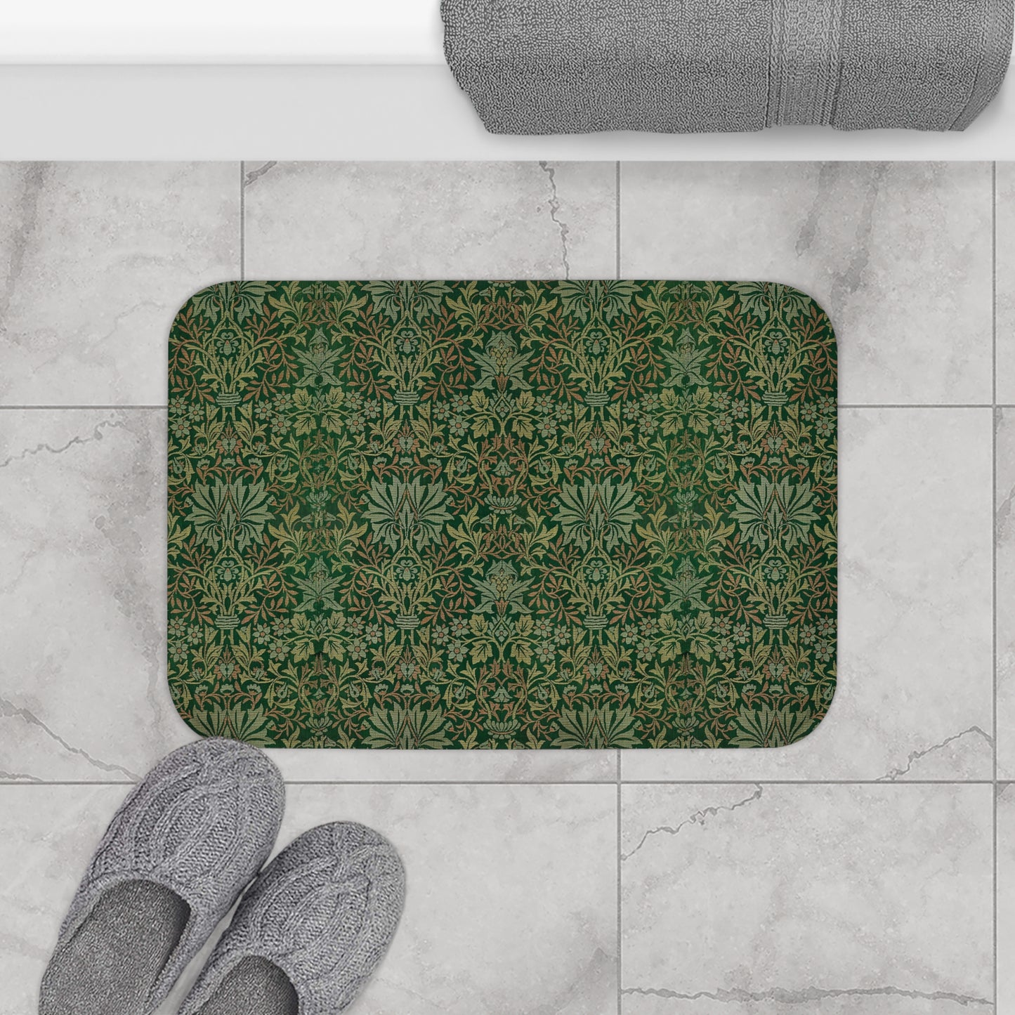 Rectangular microfibre bath mat with an intricate floral pattern in green shades, inspired by William Morris.