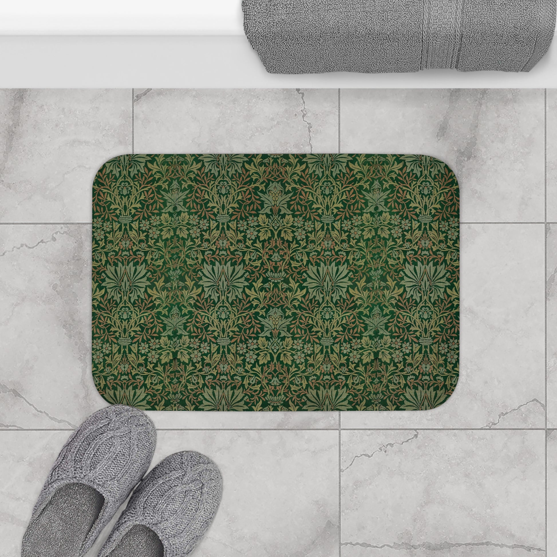 Rectangular microfibre bath mat with an intricate floral pattern in green shades, inspired by William Morris.