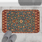 Decorative rug with floral pattern on a marble floor, with slippers and a bath mat in the foreground.