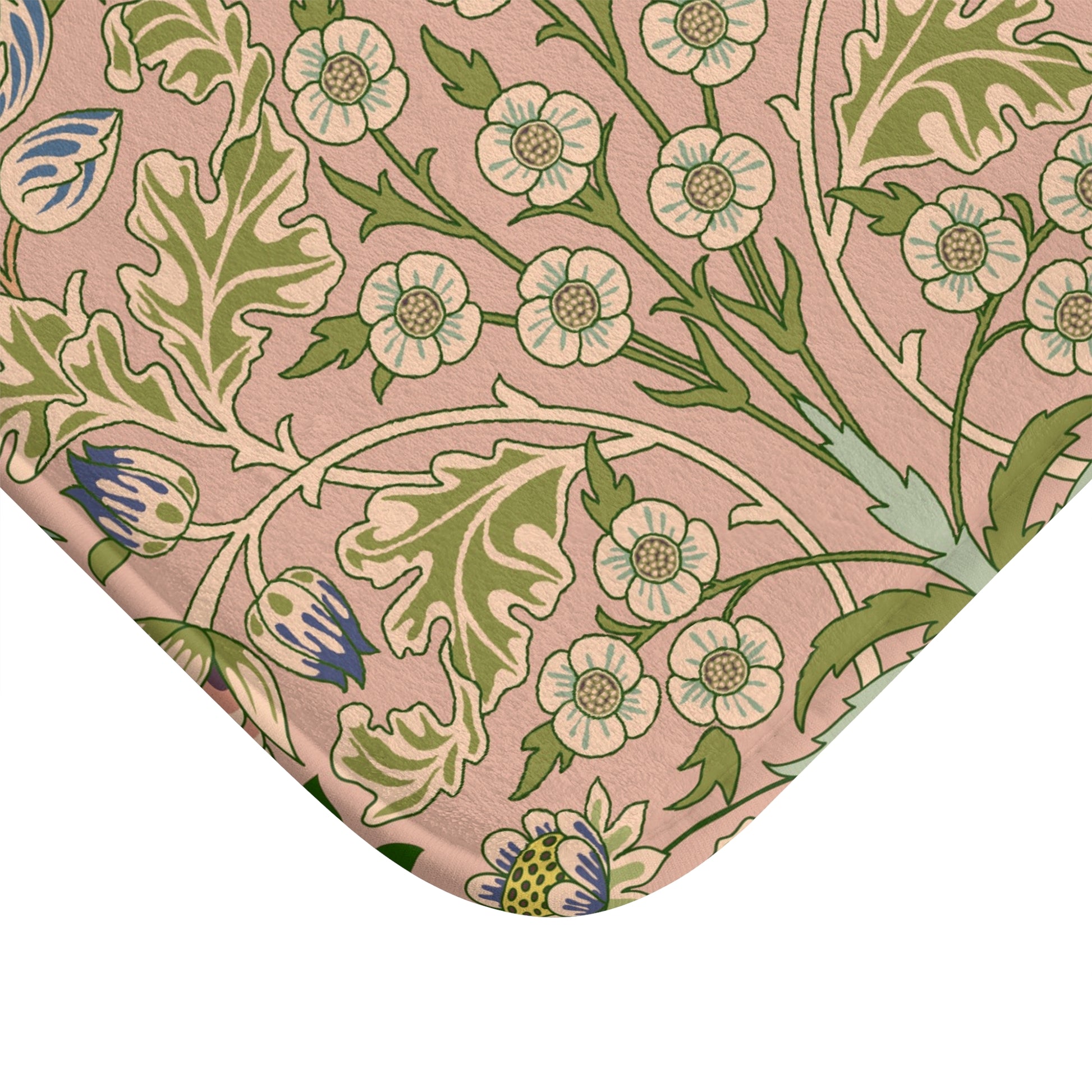 A rectangular microfibre bath mat with a floral pattern inspired by William Morris, in colours pink, green, and white.