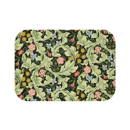 Microfibre bath mat with a green background featuring floral patterns inspired by William Morris.