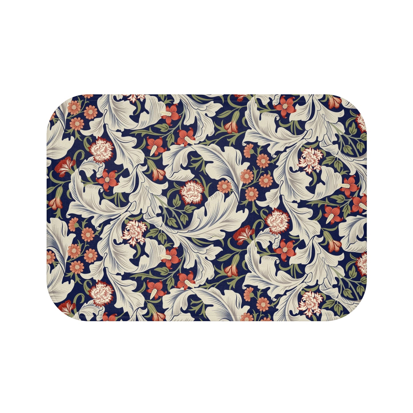 A rectangular microfibre bath mat with a floral pattern inspired by William Morris, predominantly in blue and white colours.