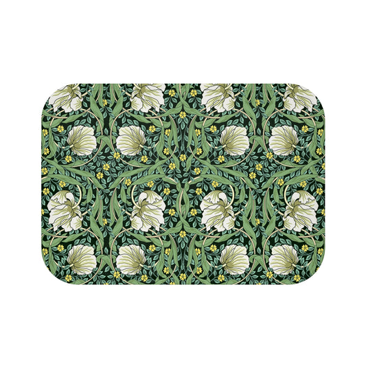 Microfibre bath mat with a green floral pattern inspired by William Morris, featuring a non-slip backing.
