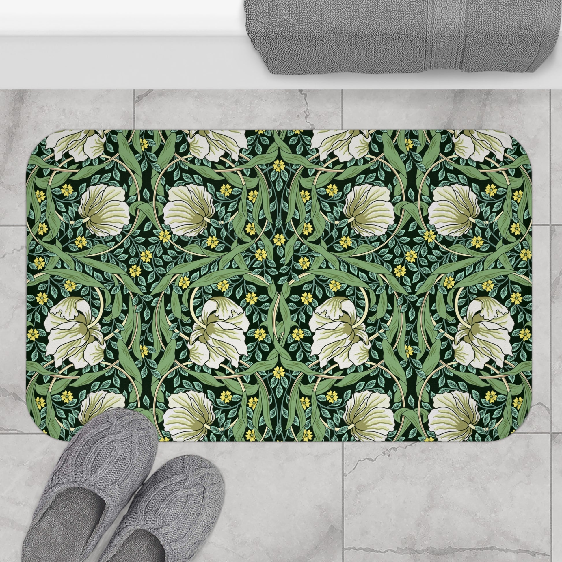 Microfibre bath mat with a green floral pattern inspired by William Morris, featuring a non-slip backing.