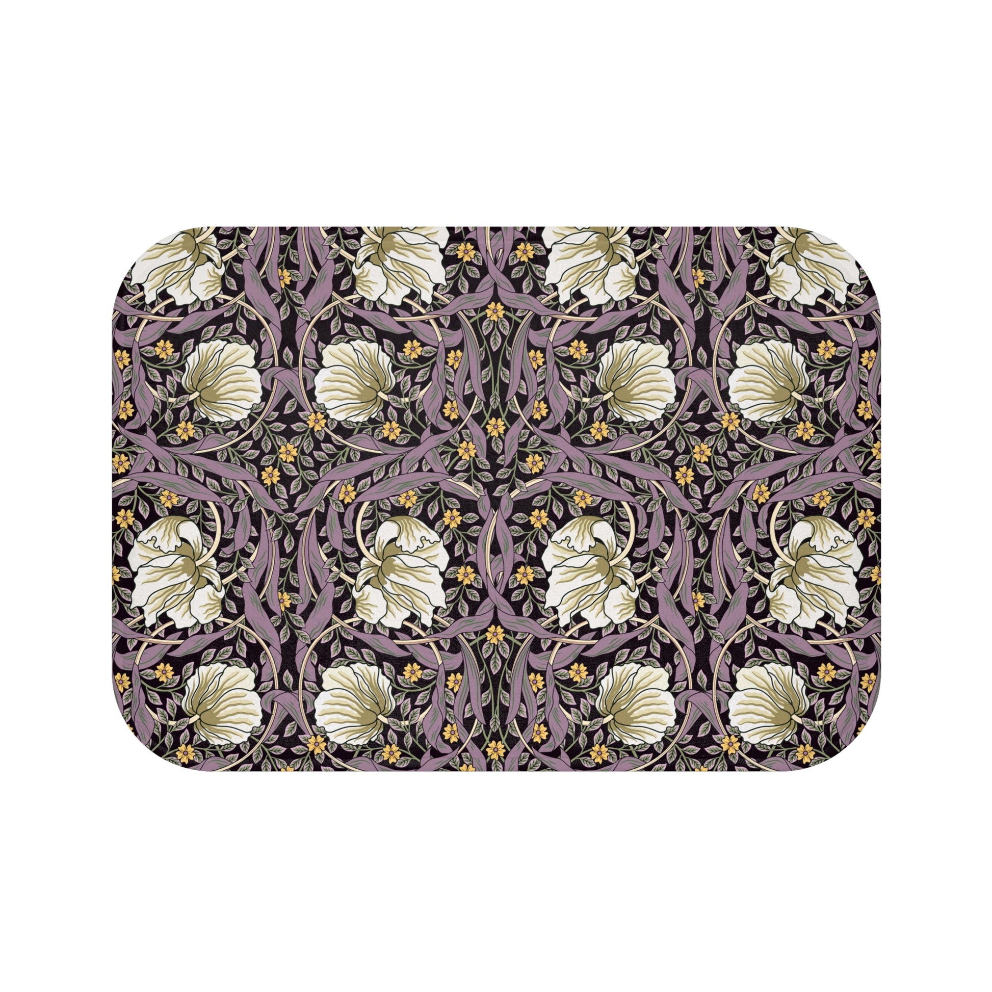 A rectangular microfibre bath mat with a floral pattern inspired by William Morris, predominantly in pink, purple and gold colours.