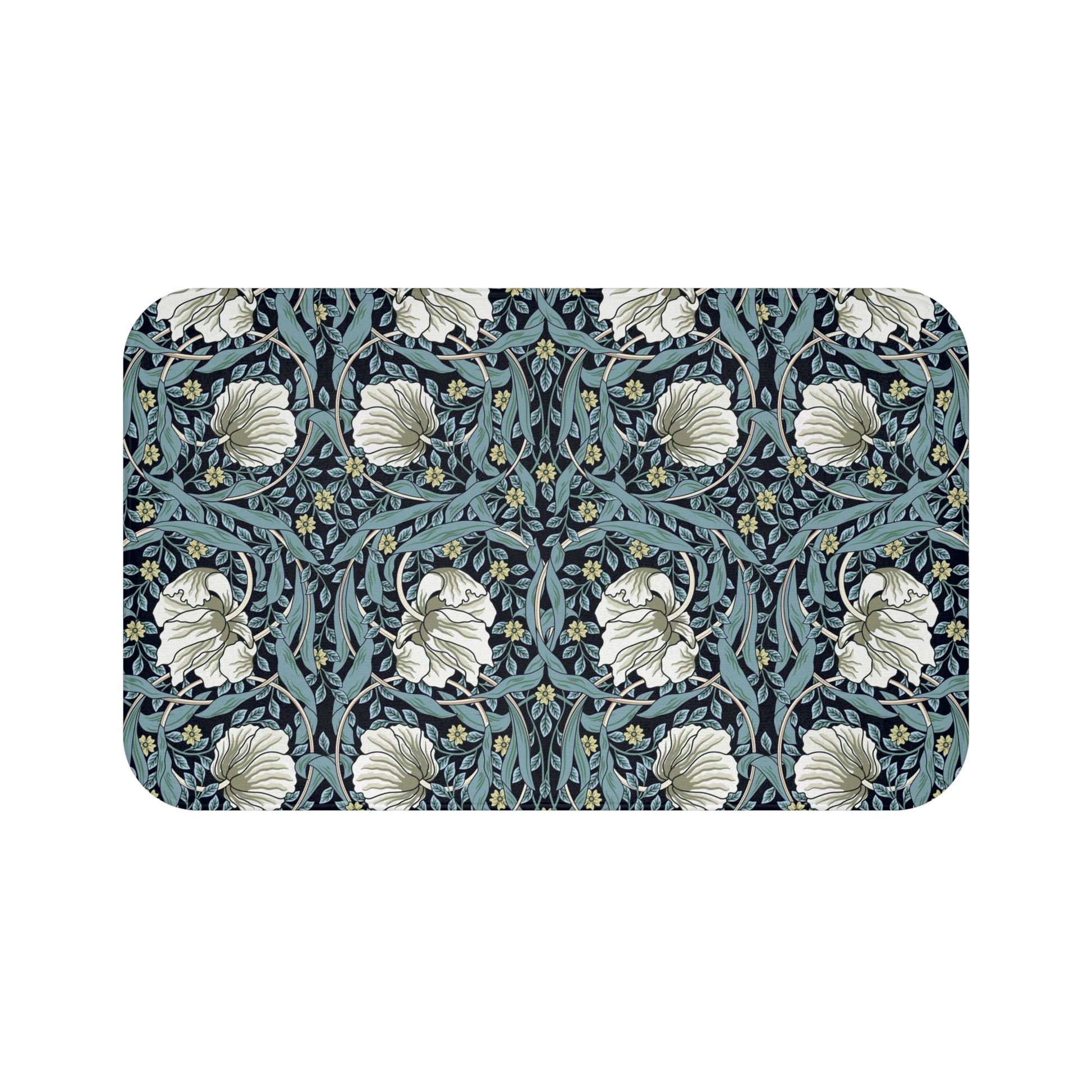 A rectangular microfibre bath mat with a floral pattern in shades of blue and white, inspired by William Morris' design.