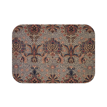 A rectangular microfibre bath mat with a floral pattern inspired by William Morris, in colours predominantly brown and green.