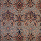 A rectangular microfibre bath mat with a floral pattern inspired by William Morris, in colours predominantly brown and green.