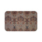 A rectangular microfibre bath mat with a floral pattern inspired by William Morris, in colors predominantly brown and green.