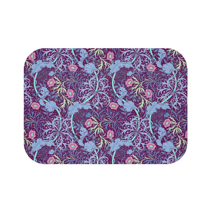 Rectangular microfibre bath mat with a pink flower and seaweed pattern inspired by William Morris.
