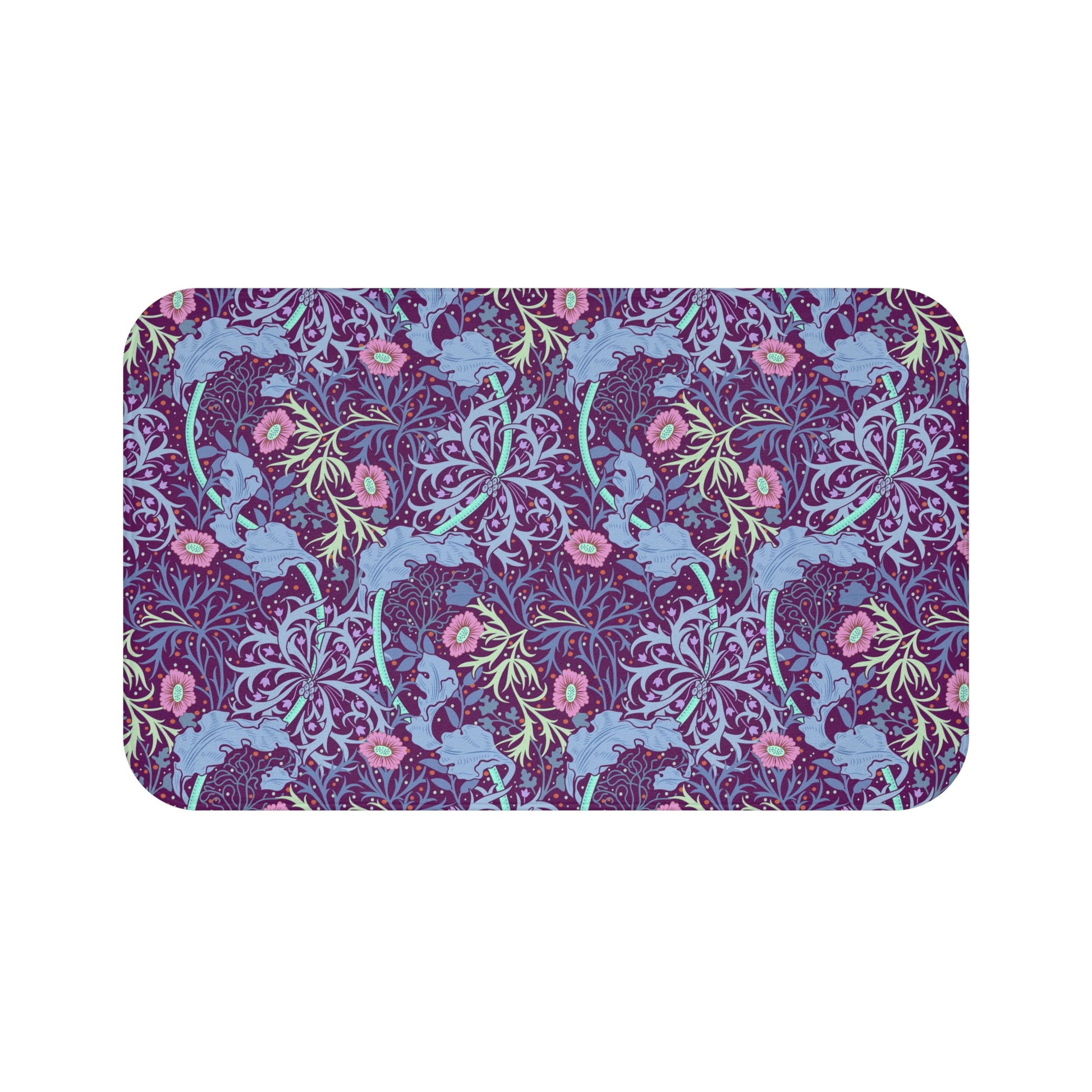 Rectangular microfibre bath mat with a pink flower and seaweed pattern inspired by William Morris.