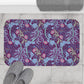 Rectangular microfibre bath mat with a pink flower and seaweed pattern inspired by William Morris.