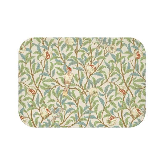 Microfibre bath mat with a floral pattern featuring birds and pomegranates in a beige colour inspired by William Morris.