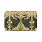 Microfibre bath mat with a floral and black swan pattern on a beige background.
