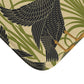Microfibre bath mat with a floral and black swan pattern on a beige background.