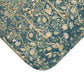 Floral and bird patterned fabric swatch on a blue background