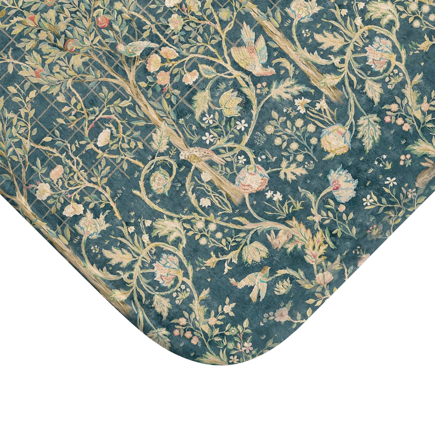 Floral and bird patterned fabric swatch on a blue background