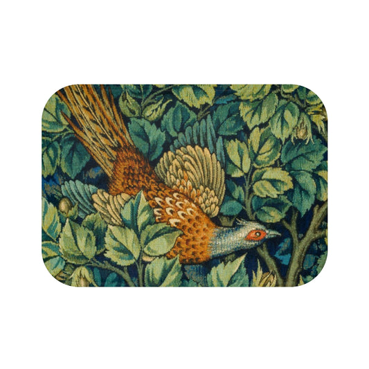 A microfibre bath mat with a William Morris  floral pattern featuring an artistic representation of a pheasant surrounded by leaves.