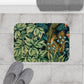 Microfibre bath mat with a William Morris  floral and squirrel design, predominantly in green and brown colours.