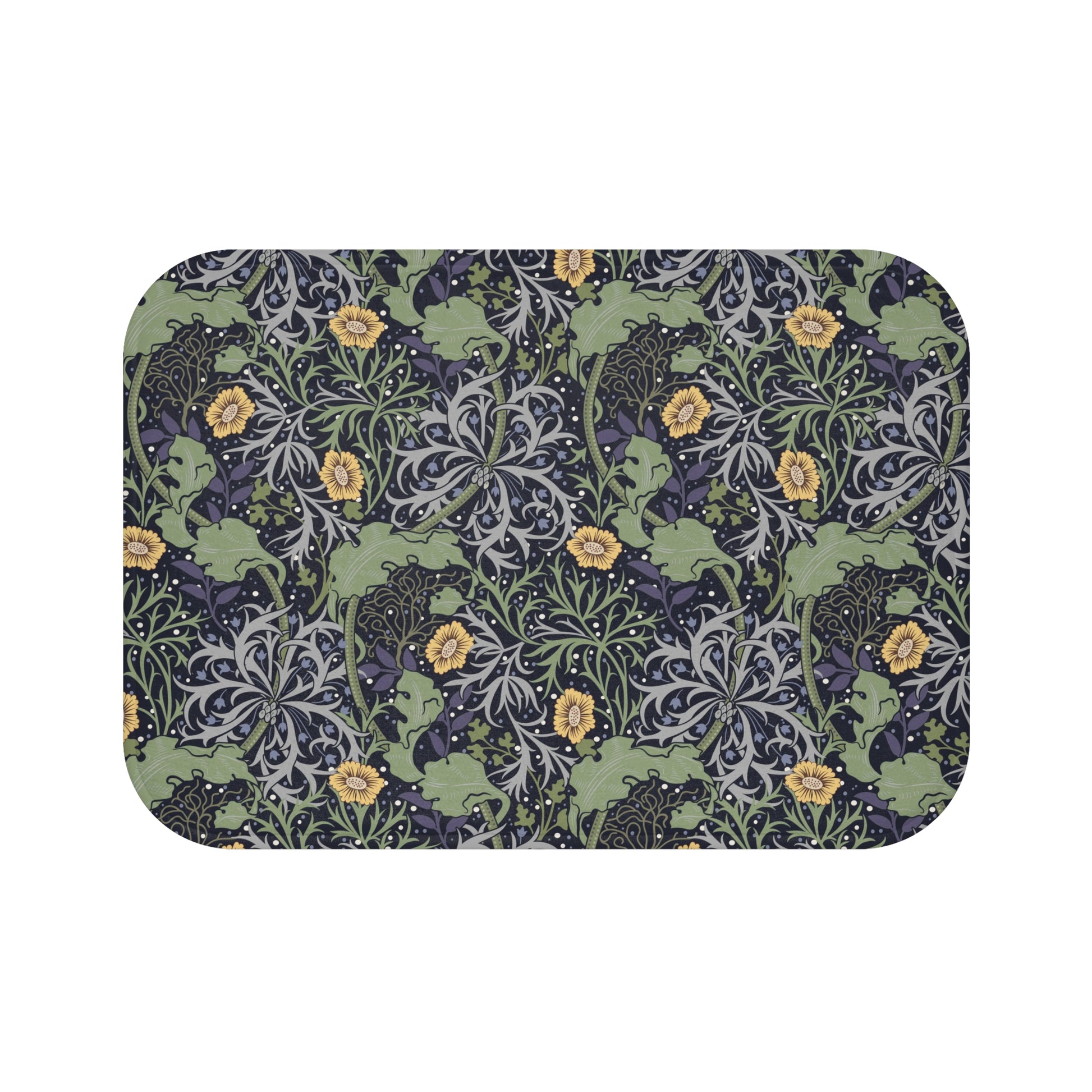 Microfibre bath mat with a floral pattern inspired by William Morris, predominantly yellow flowers with green leaves on a black background.
