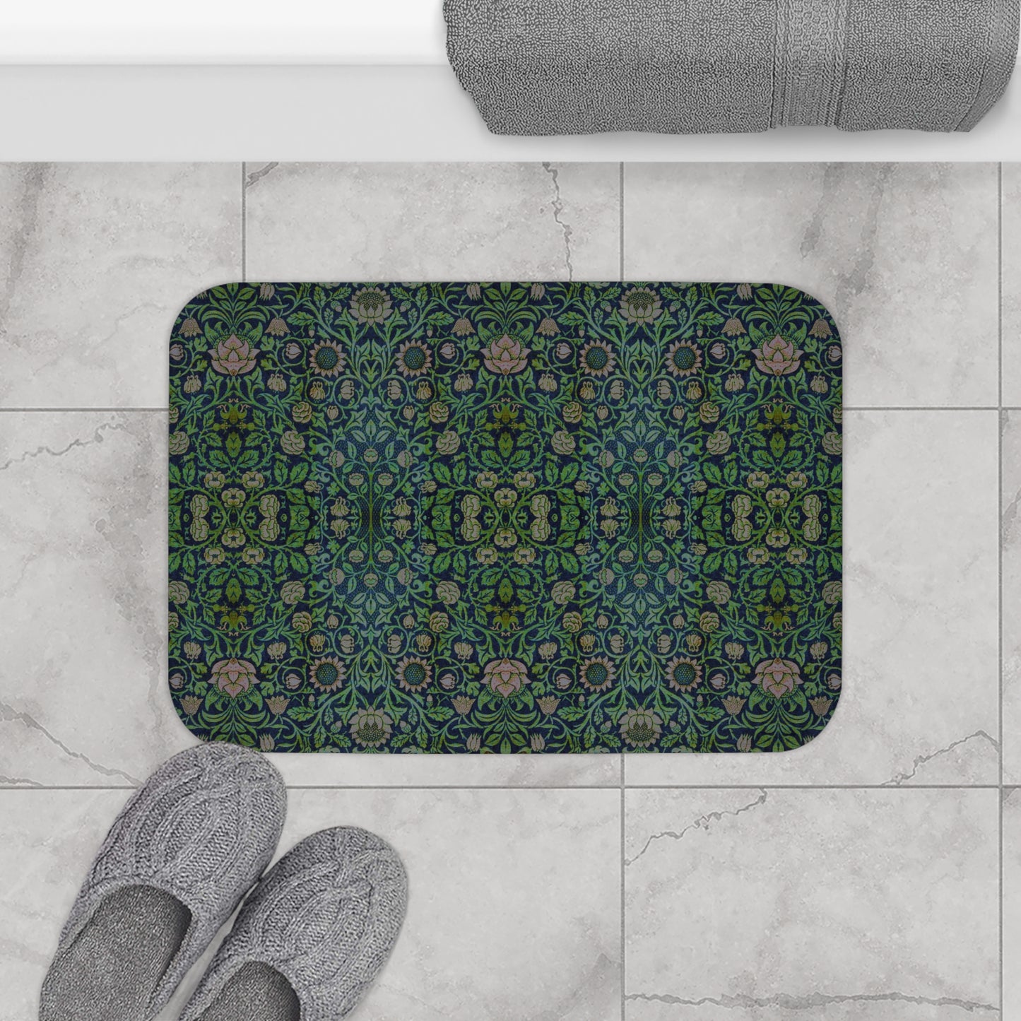 Rectangular microfibre bath mat with a green floral pattern inspired by William Morris design.