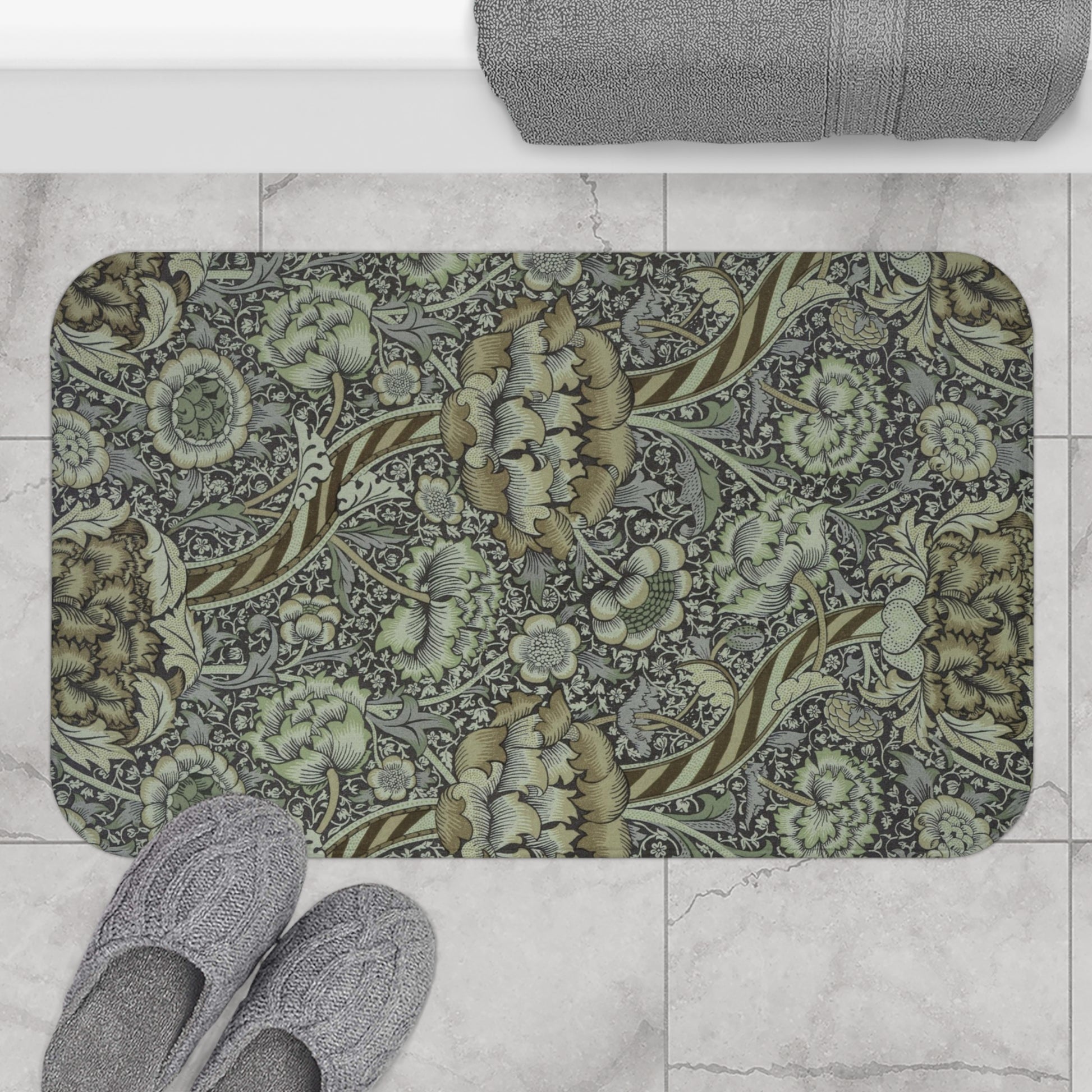 Rectangular microfibre bath mat with an elegant William Morris floral pattern in grey colours, with a non-slip border.