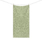 A rectangular fabric towel with an all-over botanical damask pattern in sage green and light sage green, hanging from a clothesline with two wooden clips against a plain white background.